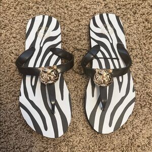 Reserved Black Zebra-Print Thong Sandals with Gold Tiger Accent
